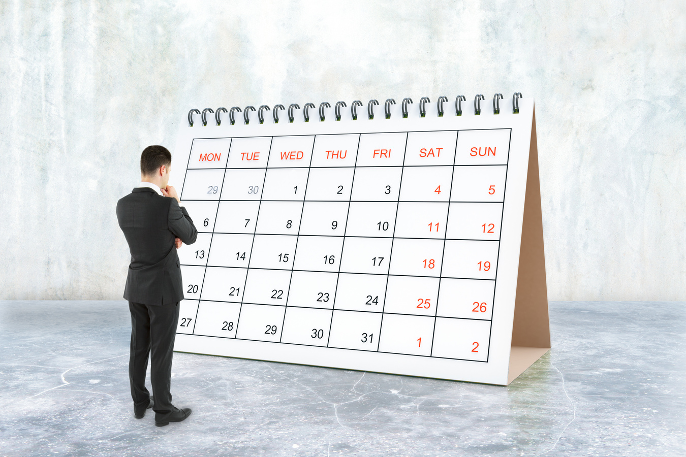 Businessman looking at calendar