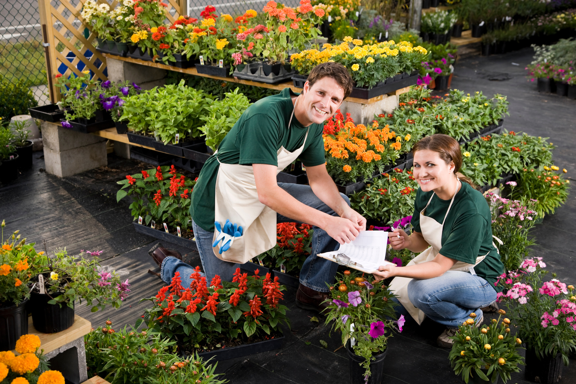 Plant nursery retail store worker taking inventory